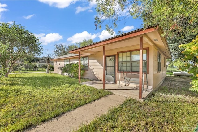 exterior space with a lawn