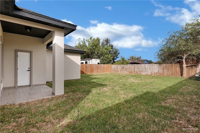 view of yard with a patio area