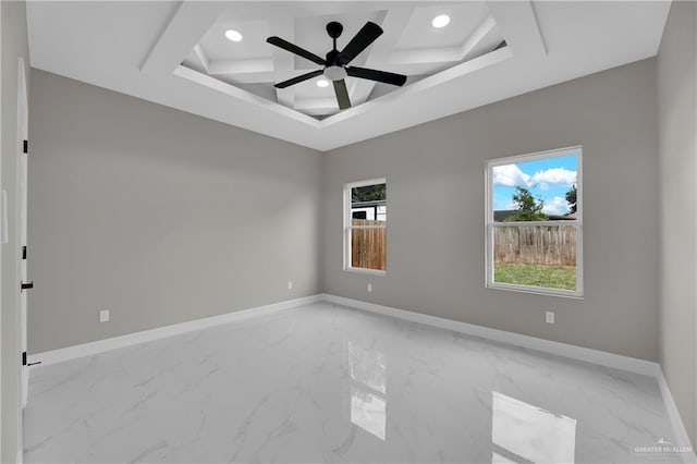 unfurnished room with ceiling fan