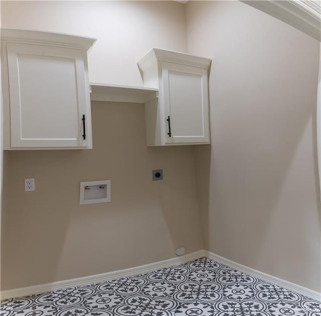 laundry room featuring electric dryer hookup, cabinets, and hookup for a washing machine