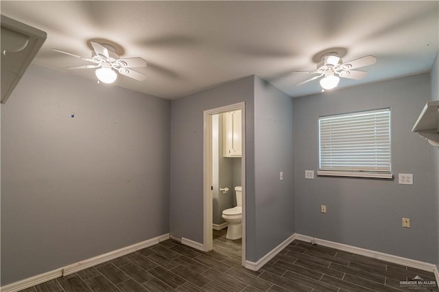 1608 Merlin Dr, Mission, TX 78572 - unfurnished bedroom featuring wood finish floors, baseboards, ceiling fan, and connected bathroom