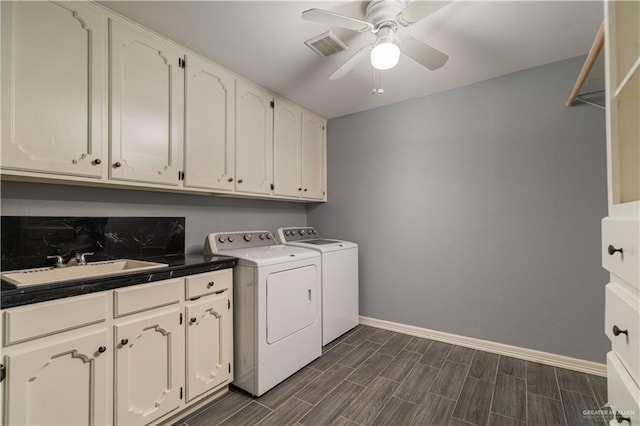 1608 Merlin Dr, Mission, TX 78572 - washroom with independent washer and dryer, ceiling fan, cabinet space, baseboards, and dark wood-style floors