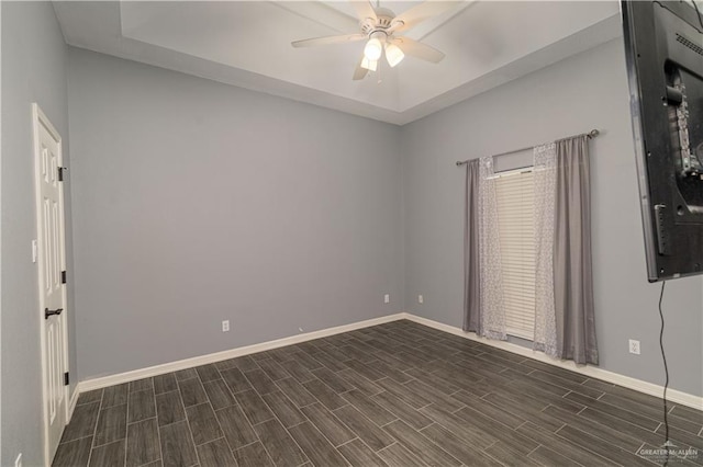 1608 Merlin Dr, Mission, TX 78572 - empty room featuring a ceiling fan, baseboards, and dark wood-type flooring