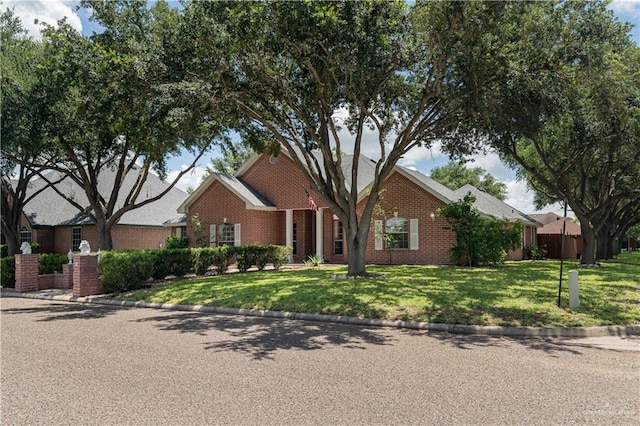 view of front of home with a front lawn