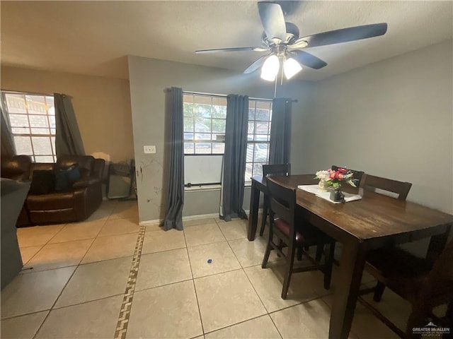 3020 Nickel Ave, Mission, TX 78574 - dining space featuring ceiling fan, light tile patterned flooring, and baseboards