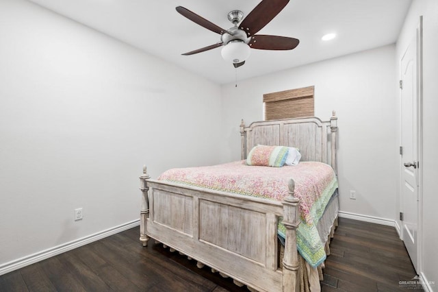 bedroom featuring ceiling fan and dark hardwood / wood-style floors