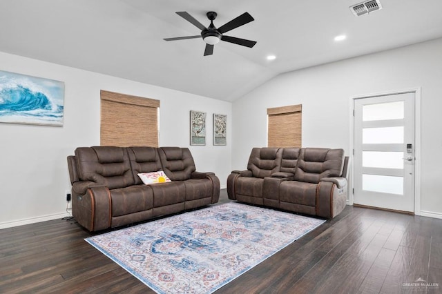 living room featuring lofted ceiling, dark hardwood / wood-style floors, and ceiling fan