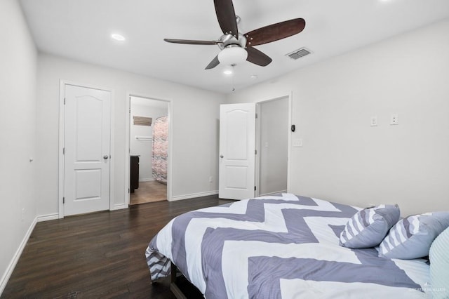 bedroom with ceiling fan and dark hardwood / wood-style floors