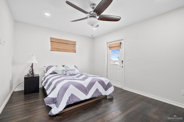 bedroom featuring dark wood-type flooring and ceiling fan