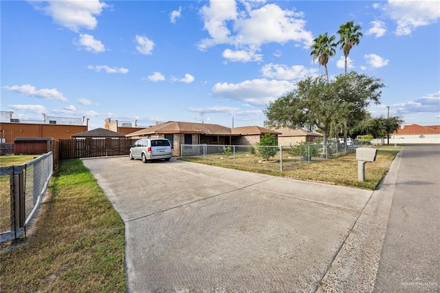 ranch-style house with a front lawn