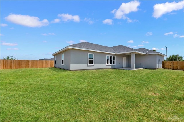 2820 Linva Ave, Mcallen, TX 78541 - back of property featuring fence, a lawn, and stucco siding