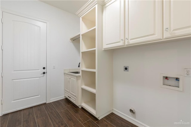 2502 Elbrus Ave, Edinburg, TX 78539 - laundry room featuring hookup for an electric dryer, washer hookup, dark wood-type flooring, and baseboards