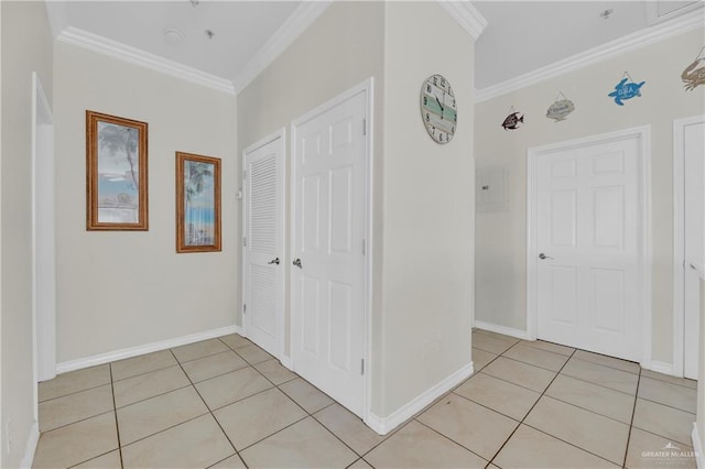 102 E Gardenia St Unit 8, South Padre Island, TX 78597 - corridor featuring ornamental molding and light tile patterned flooring