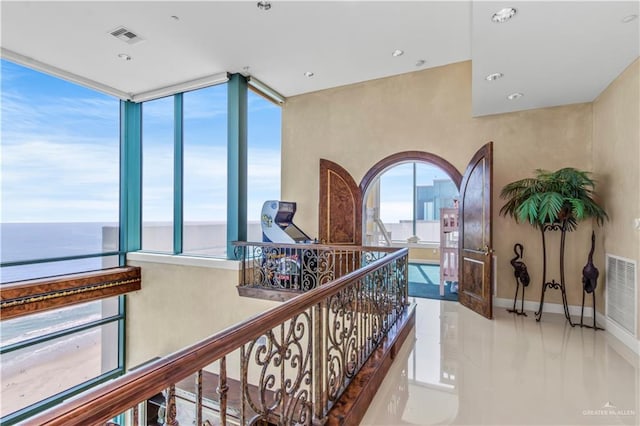 310A Padre Blvd Unit 3101, South Padre Island, TX 78597 - hallway with a water view, an upstairs landing, and recessed lighting