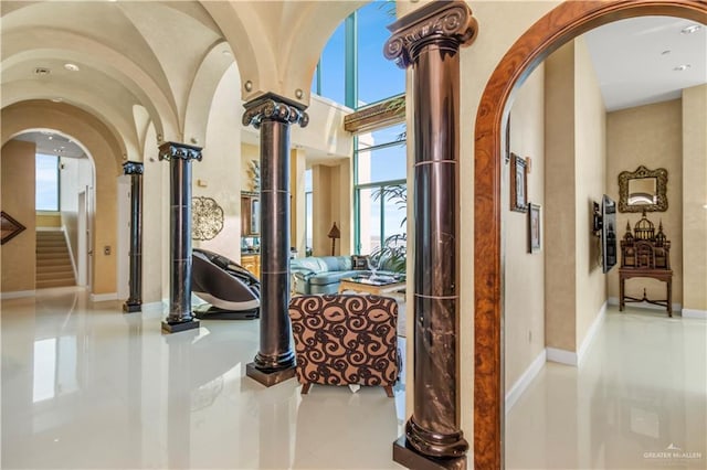 310A Padre Blvd Unit 3101, South Padre Island, TX 78597 - hall with arched walkways, tile patterned floors, and stairway
