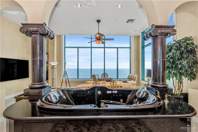 310A Padre Blvd Unit 3101, South Padre Island, TX 78597 - detailed view of arched walkways, a ceiling fan, and ornate columns