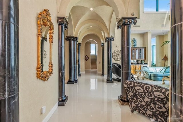 310A Padre Blvd Unit 3101, South Padre Island, TX 78597 - hall with arched walkways, plenty of natural light, and tile patterned flooring