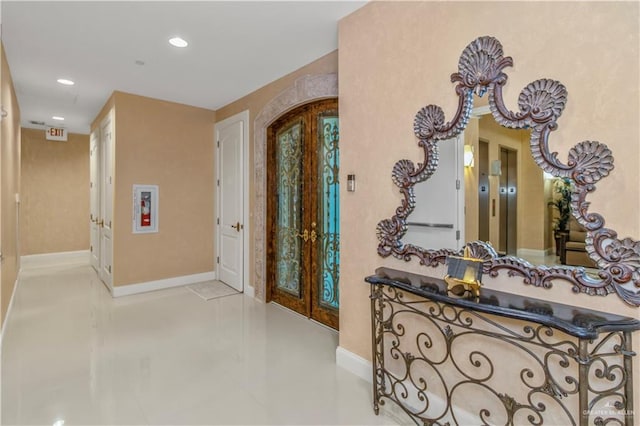 310A Padre Blvd Unit 3101, South Padre Island, TX 78597 - tiled entryway featuring french doors and recessed lighting
