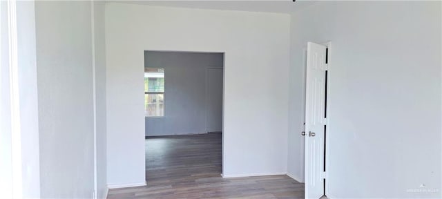 1217 S 1st St, Harlingen, TX 78550 - hall with wood finished floors and baseboards