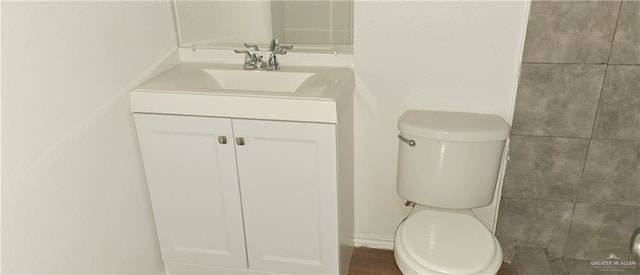 1217 S 1st St, Harlingen, TX 78550 - bathroom with toilet and vanity
