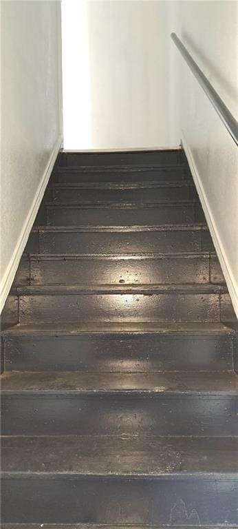 1217 S 1st St, Harlingen, TX 78550 - stairs with hardwood / wood-style floors