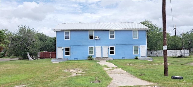 1217 S 1st St, Harlingen, TX 78550 - view of front of home with a metal roof