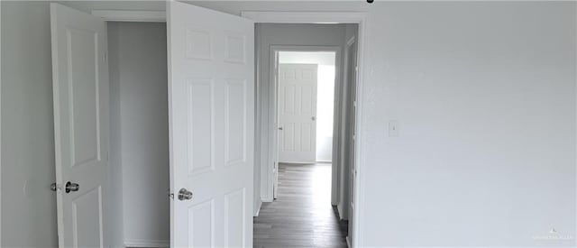 1217 S 1st St, Harlingen, TX 78550 - hall featuring baseboards and wood finished floors