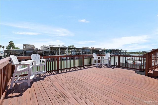 deck featuring a water view