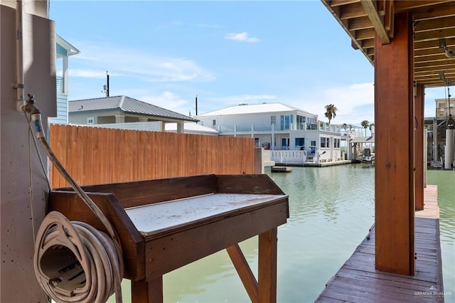 view of dock with a water view