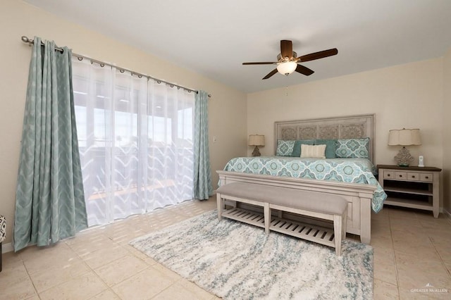 bedroom featuring tile patterned flooring and ceiling fan