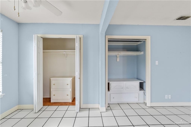 3206 Marion Ct, Harlingen, TX 78550 - unfurnished bedroom featuring multiple closets and a ceiling fan