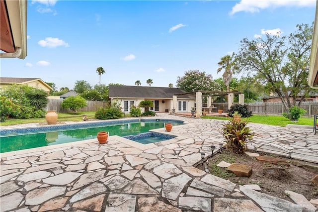 3206 Marion Ct, Harlingen, TX 78550 - view of swimming pool featuring an in-ground hot tub, a patio, and a fenced backyard