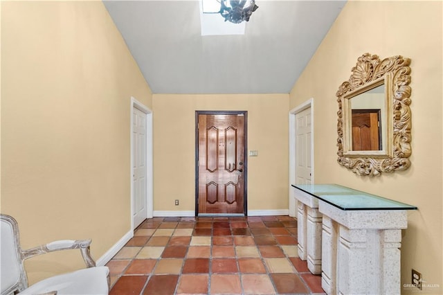 3206 Marion Ct, Harlingen, TX 78550 - tiled foyer entrance with baseboards and lofted ceiling