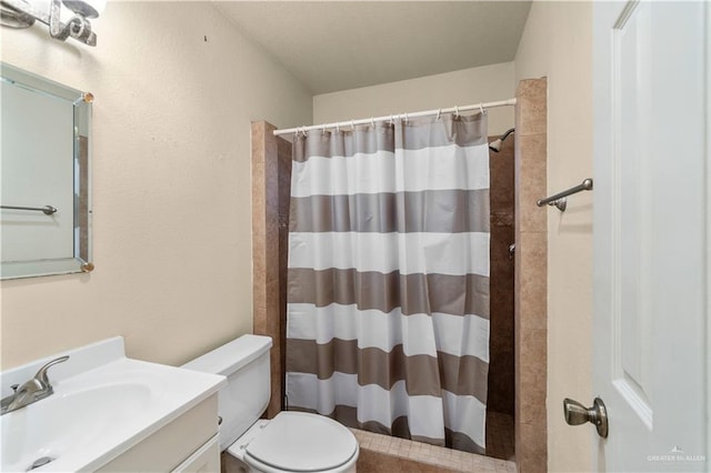 3206 Marion Ct, Harlingen, TX 78550 - full bathroom featuring vanity and curtained shower