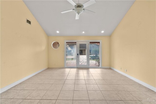 3206 Marion Ct, Harlingen, TX 78550 - unfurnished room with a ceiling fan, light tile patterned flooring, vaulted ceiling, and recessed lighting