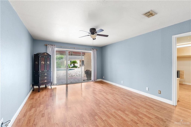 3206 Marion Ct, Harlingen, TX 78550 - spare room with ceiling fan, light wood finished floors, and a textured wall