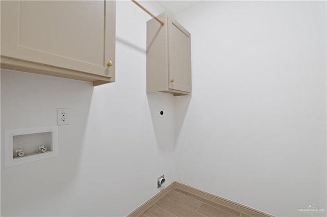 905 E 38th St E, San Juan, TX 78589 - laundry area with hookup for an electric dryer, cabinet space, washer hookup, and baseboards