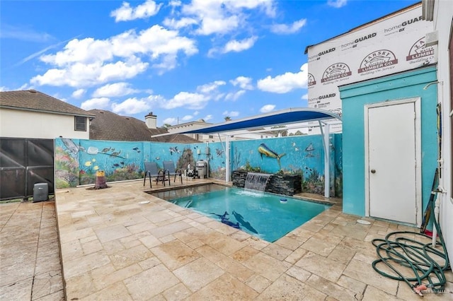view of pool with a patio area, a fenced in pool, and a fenced backyard