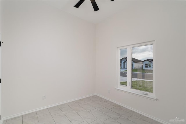 328 N Leon Ave, Elsa, TX 78543 - spare room featuring a ceiling fan and baseboards