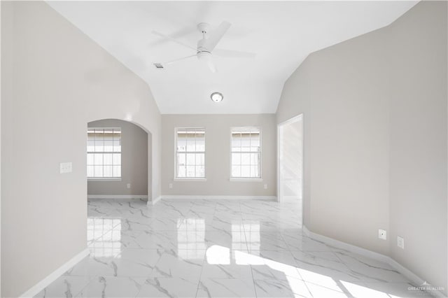 unfurnished room featuring high vaulted ceiling and ceiling fan