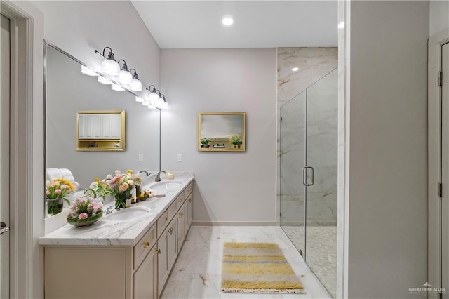 bathroom featuring vanity and a shower with shower door