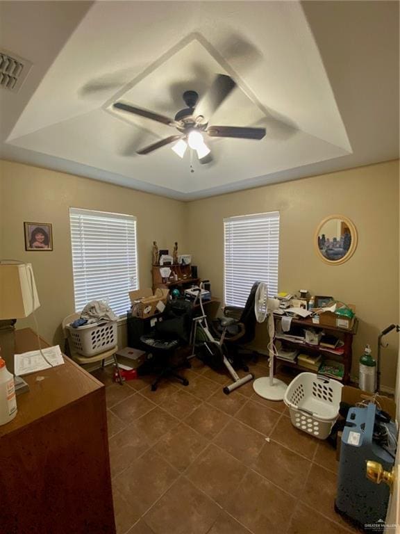 1903 E Llano Grande St, Weslaco, TX 78596 - tiled home office with a raised ceiling and ceiling fan