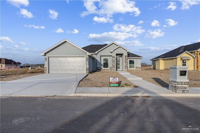 single story home featuring a garage