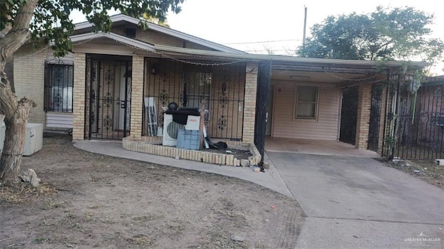 view of front facade featuring a carport