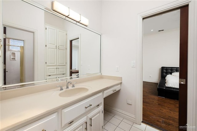 101 San Jacinto St, Mission, TX 78572 - bathroom with vanity and tile patterned flooring