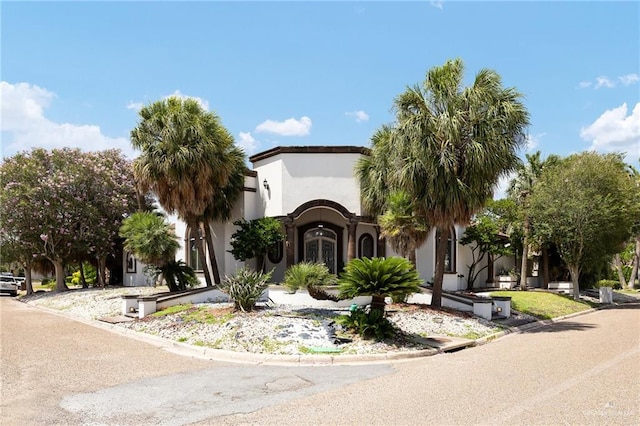 101 San Jacinto St, Mission, TX 78572 - mediterranean / spanish-style home featuring stucco siding