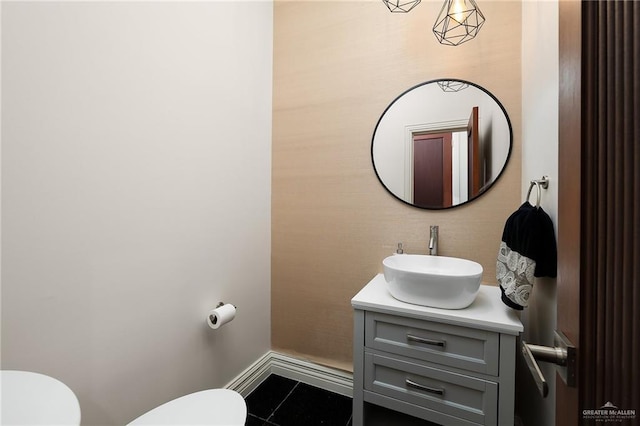 101 San Jacinto St, Mission, TX 78572 - half bathroom featuring vanity and tile patterned flooring