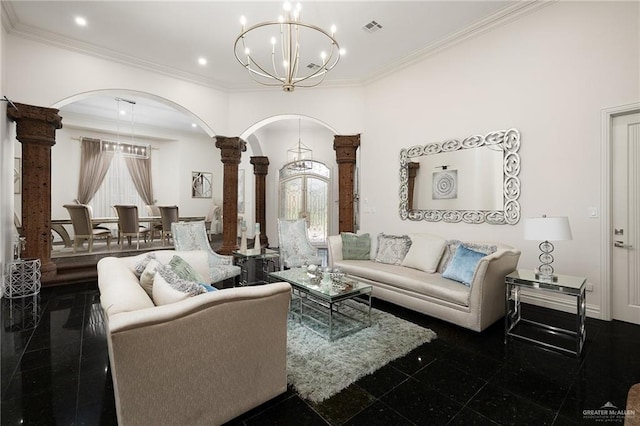 101 San Jacinto St, Mission, TX 78572 - living room featuring arched walkways, a chandelier, granite floors, decorative columns, and recessed lighting