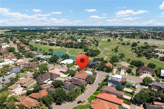 101 San Jacinto St, Mission, TX 78572 - aerial perspective of suburban area featuring a large body of water