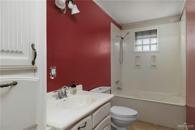 bathroom with  shower combination, vanity, toilet, and tile patterned floors